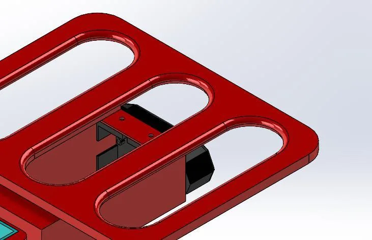 Rendu 3D de la platine ajourée du top-case, avec sa fixation arrière.